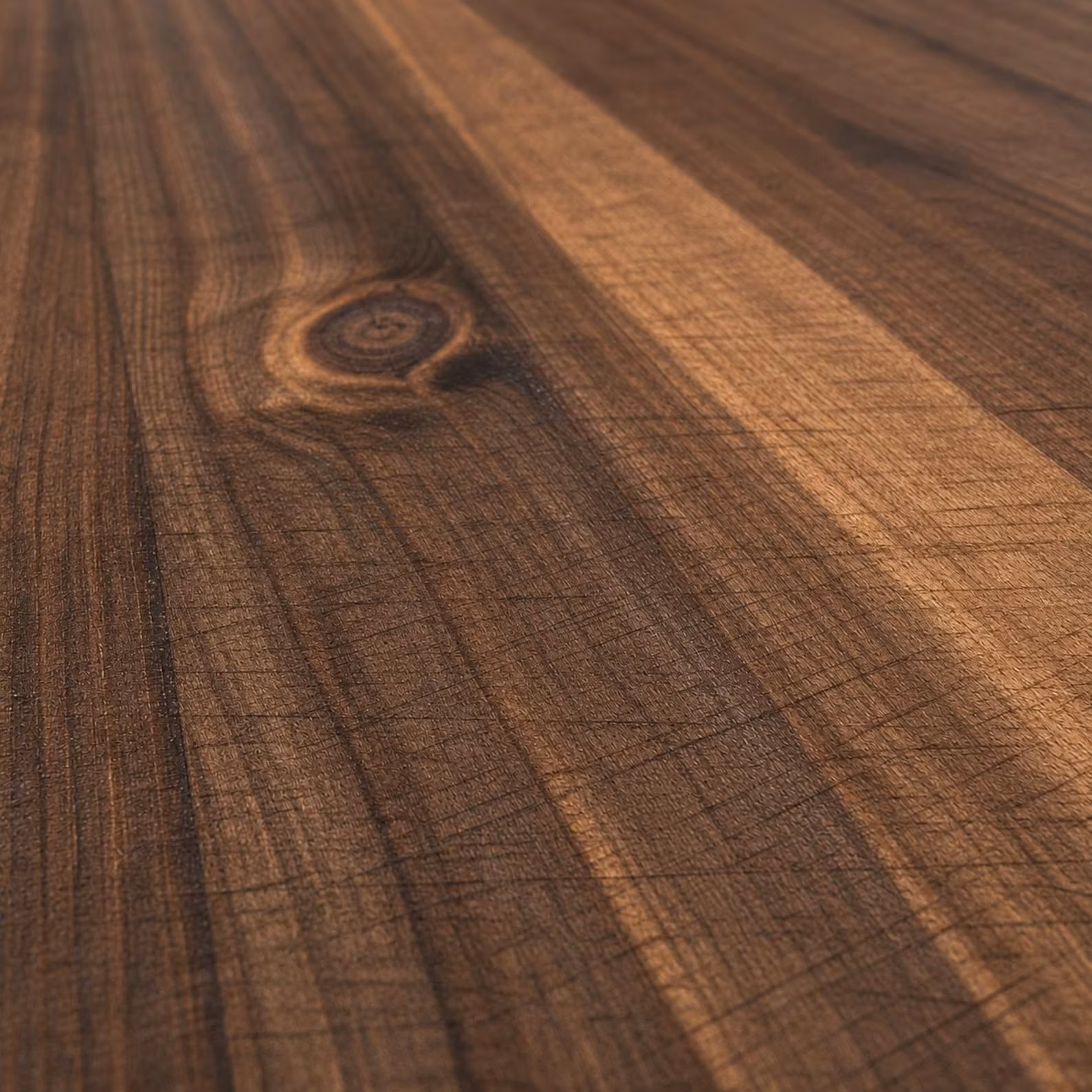Close-up of natural walnut grain and knot on the coffee table surface