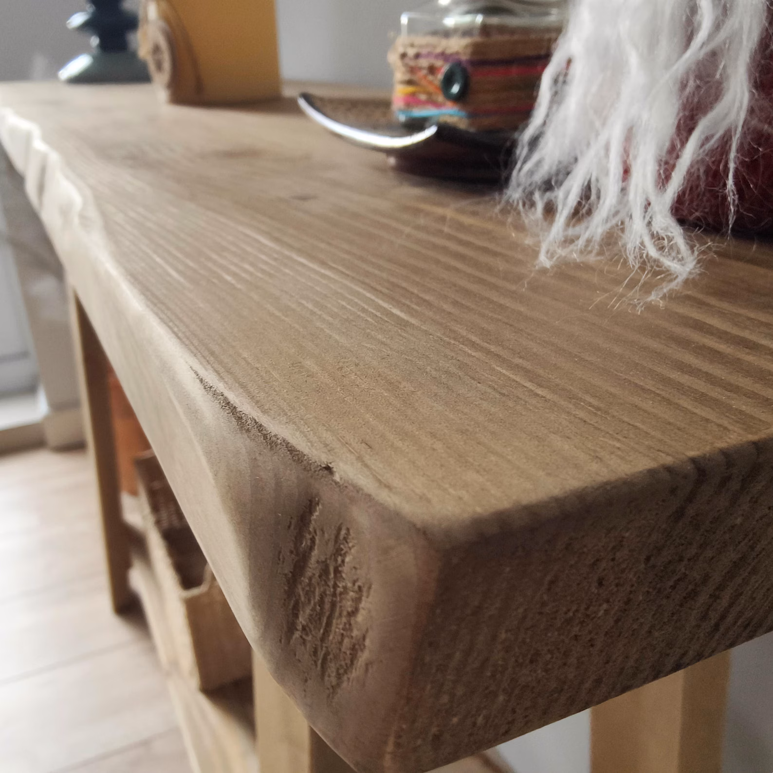 Handmade pine console table showing the natural edge and solid wood grain