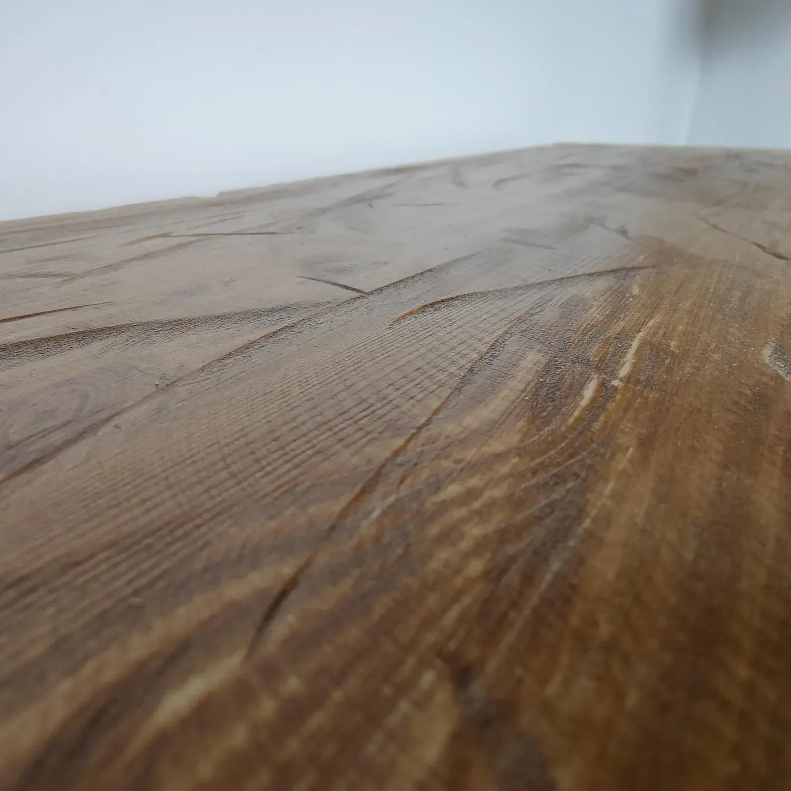Hand-finished rustic pine grain and textured console table surface